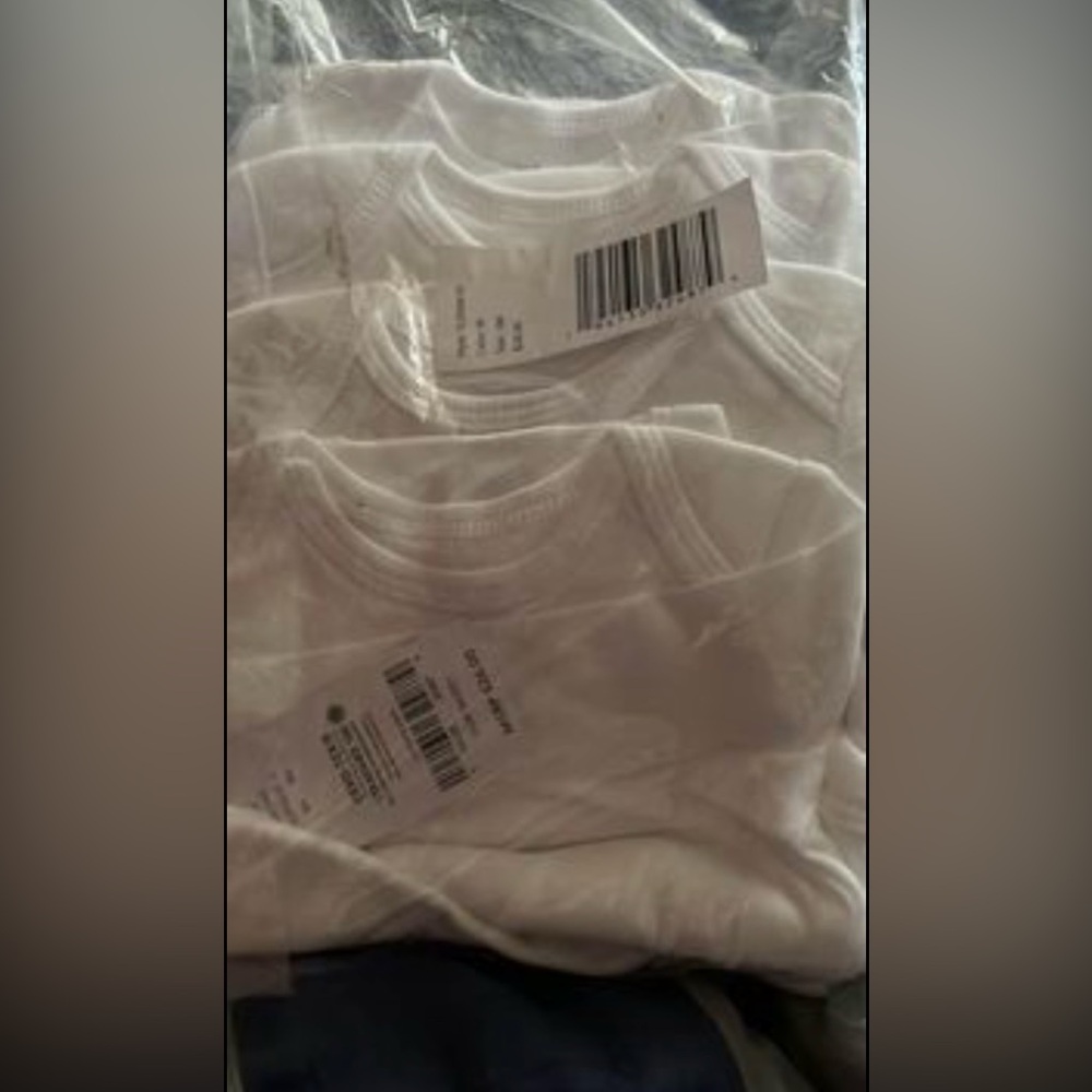 Carter’s White Baby Onesies size 3m